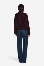 Eggplant merino high-neck sweater, back view with dropped shoulders