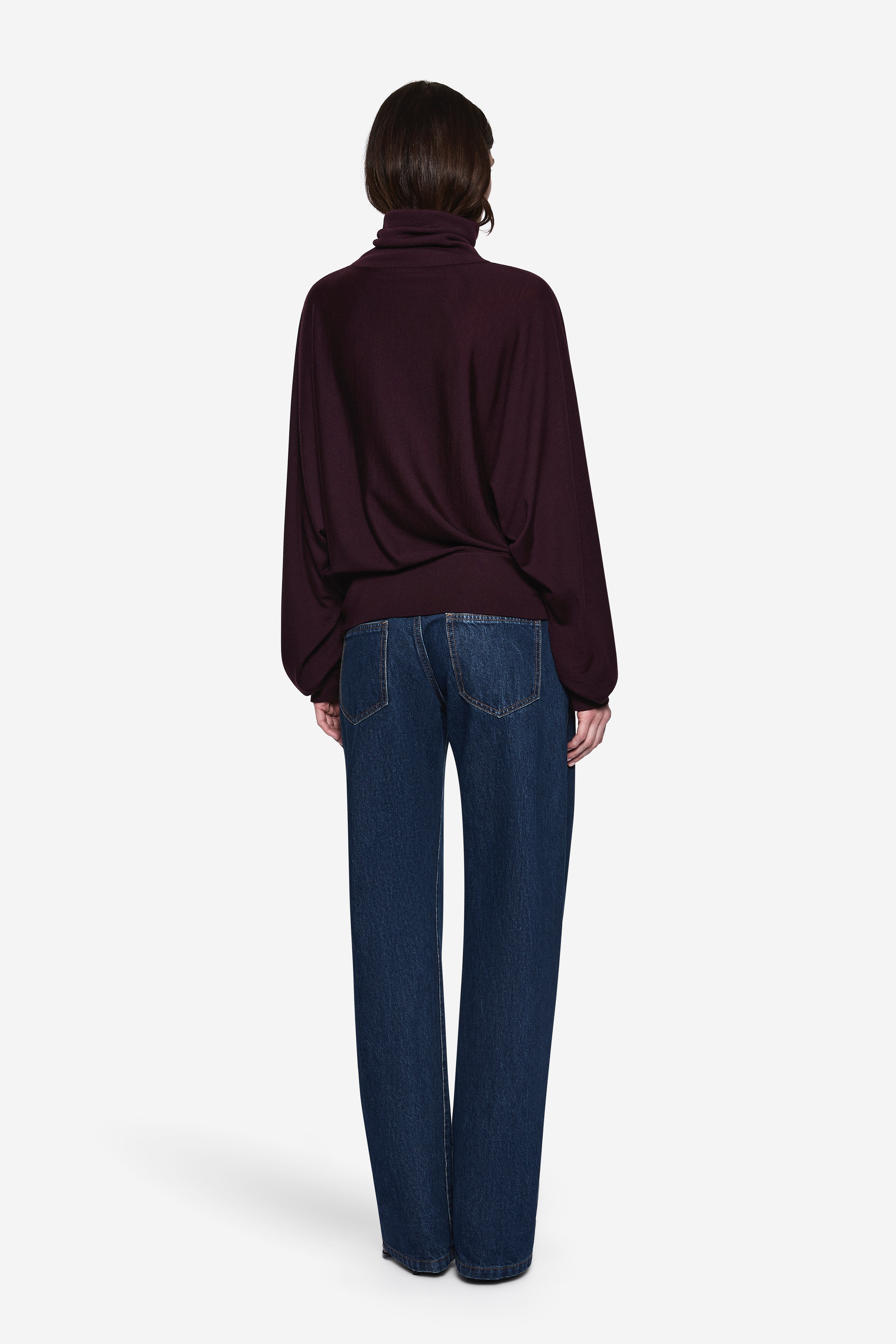 Eggplant merino high-neck sweater, back view with dropped shoulders