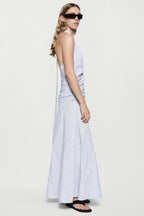 Blue-and-white striped cotton maxi dress, sleeveless halter style, full-length skirt