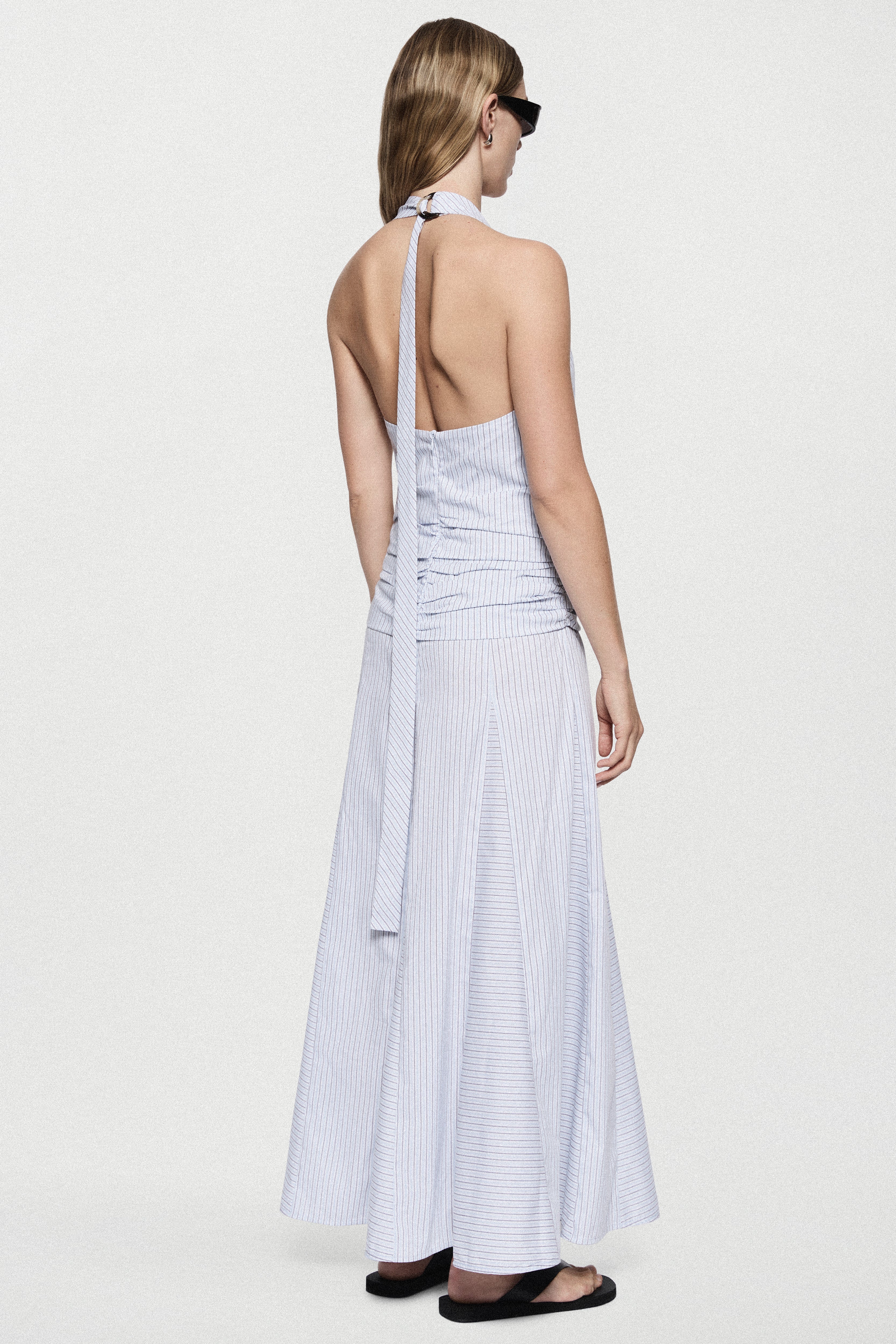 Blue-and-white striped cotton maxi dress with open back and V-neck halter