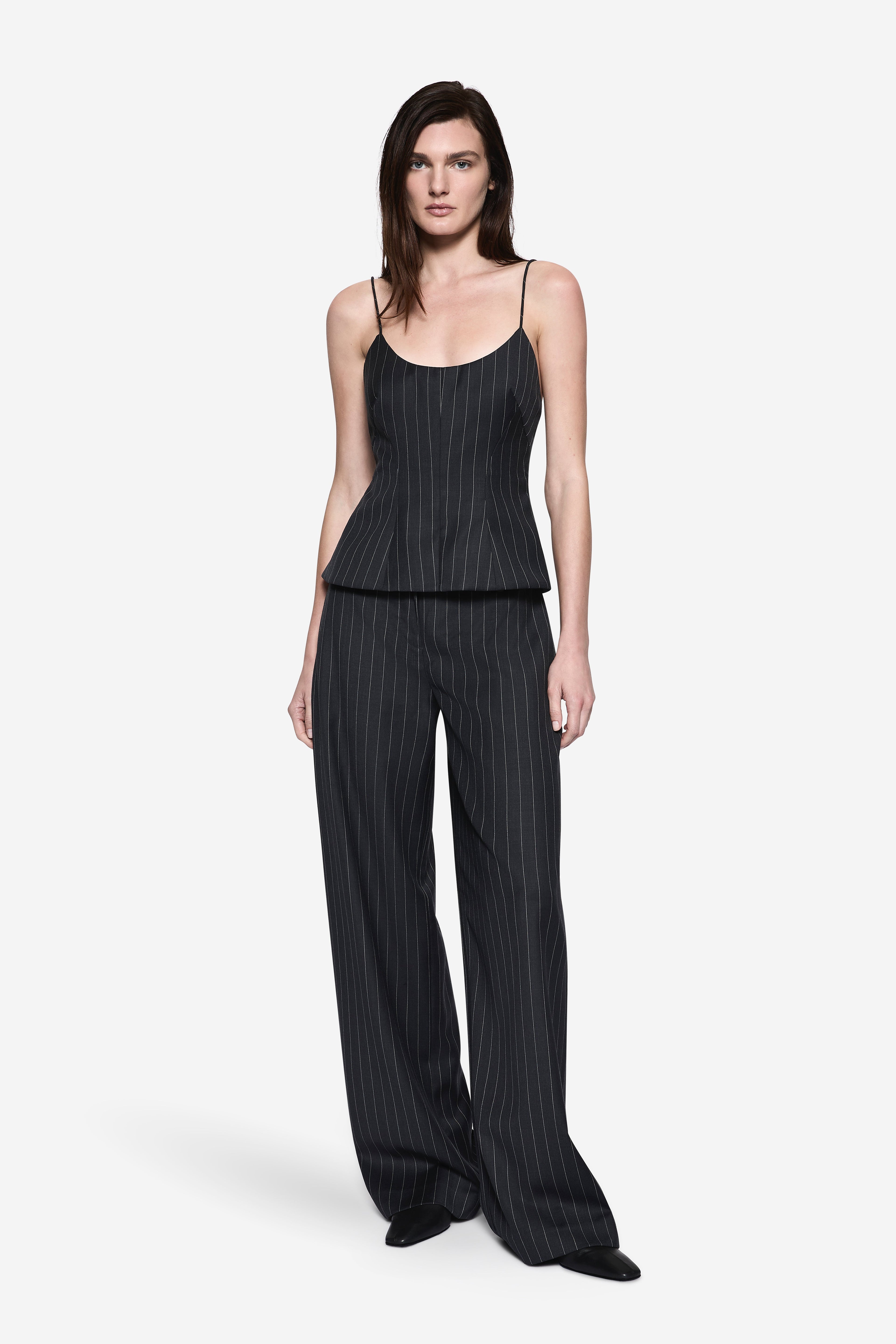 Charcoal wool pinstripe cami top with spaghetti straps and peplum hem