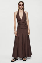 Brown cotton halter maxi dress with deep V front and flowing A-line skirt