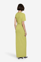 Green maxi dress back view with short sleeves and fitted drape