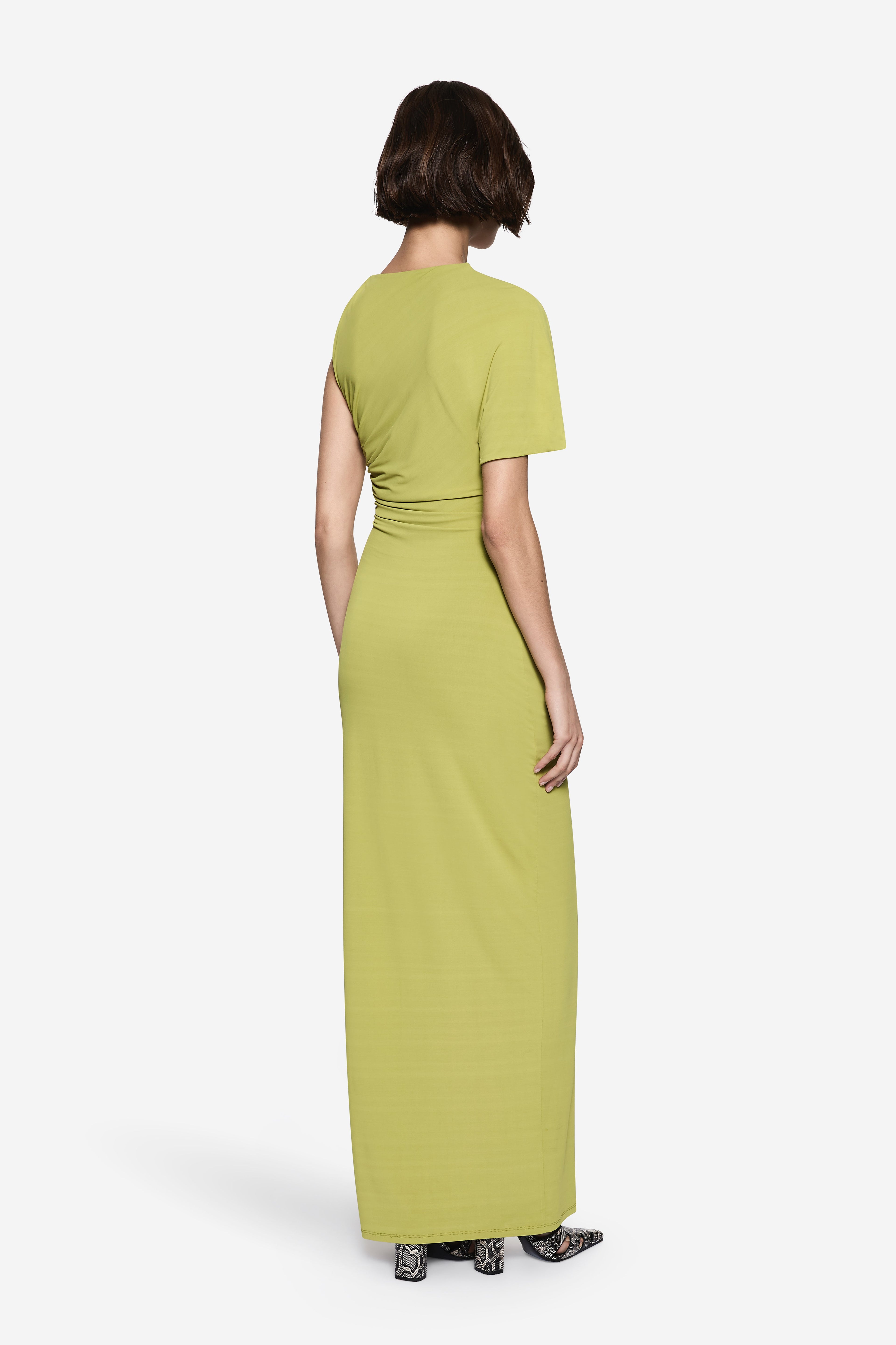 Green maxi dress back view with short sleeves and fitted drape