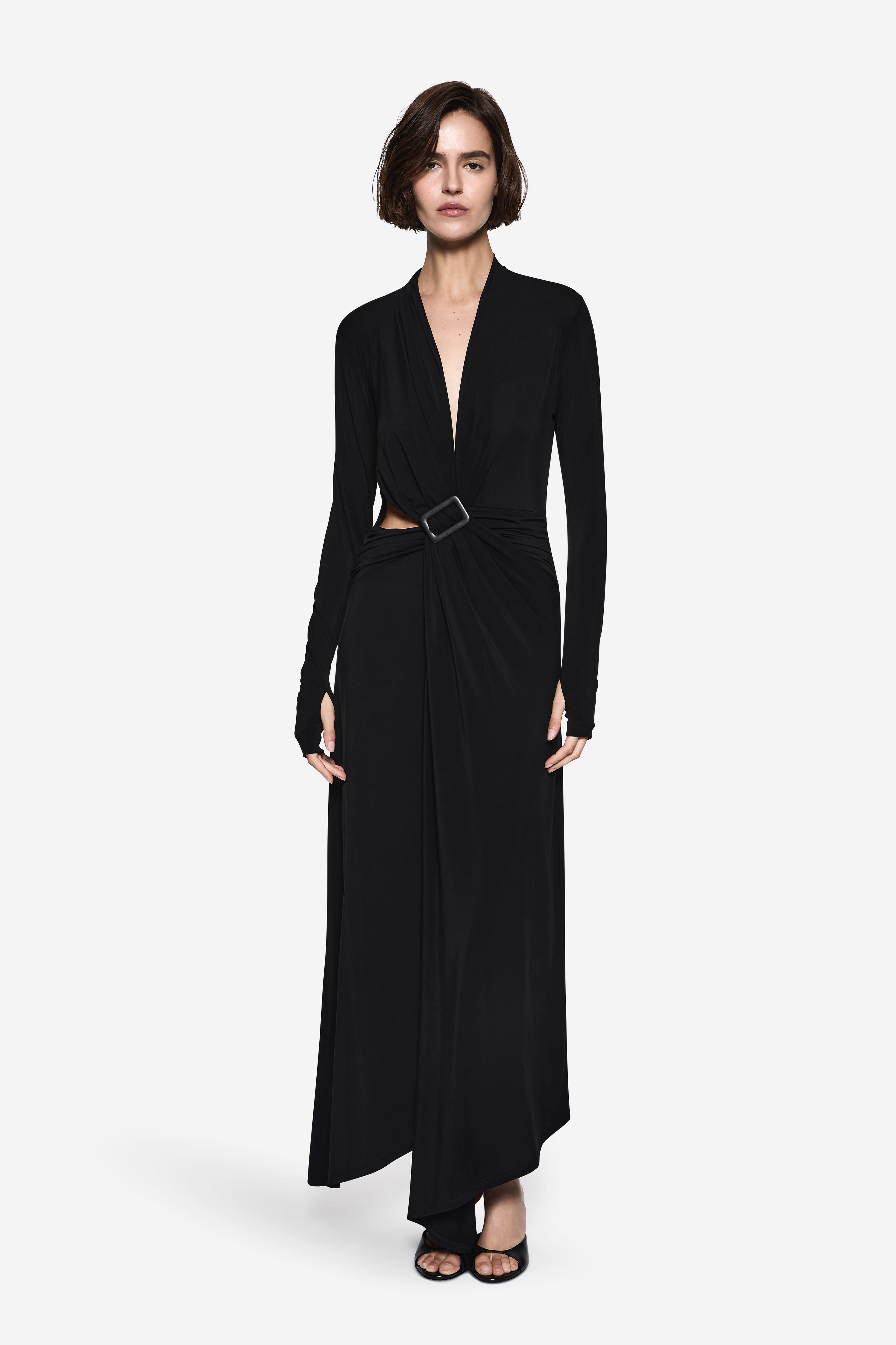Black long-sleeve wrap dress with V-neck and waist belt, front view