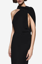 Black halter midi dress close-up with structured fit, high neck, and asymmetric shoulder wrap