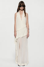 Off-white silk halter maxi dress with draped V-neck and high-low asymmetric hem