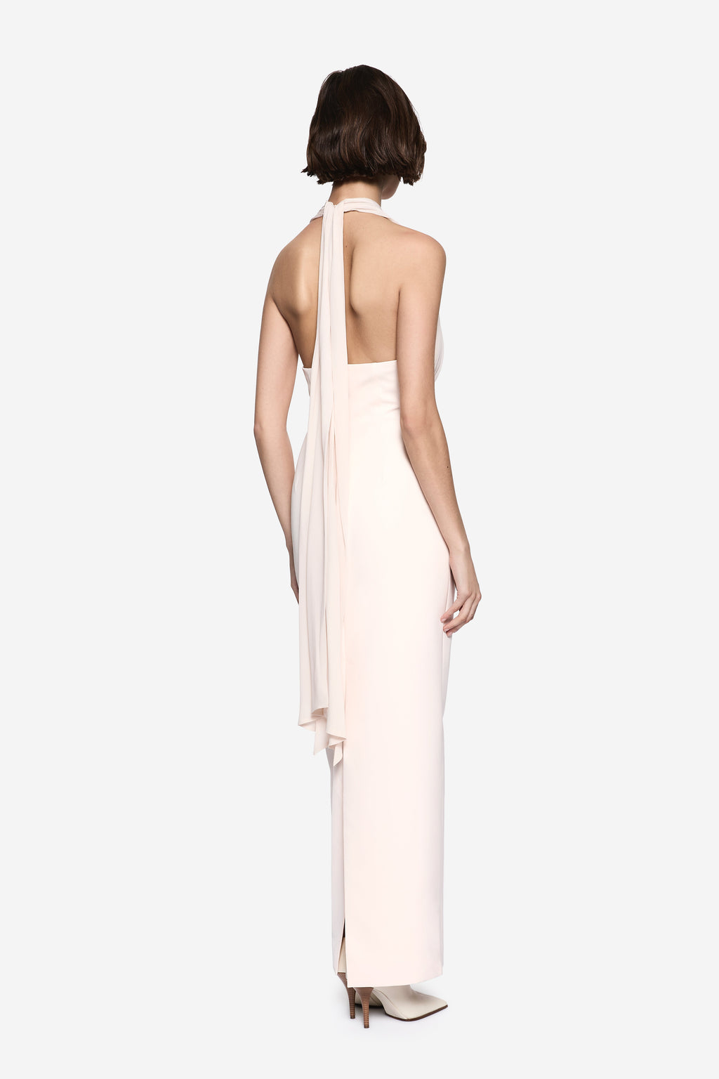 Soft pink silk midi dress with open-back halter style and low back straps