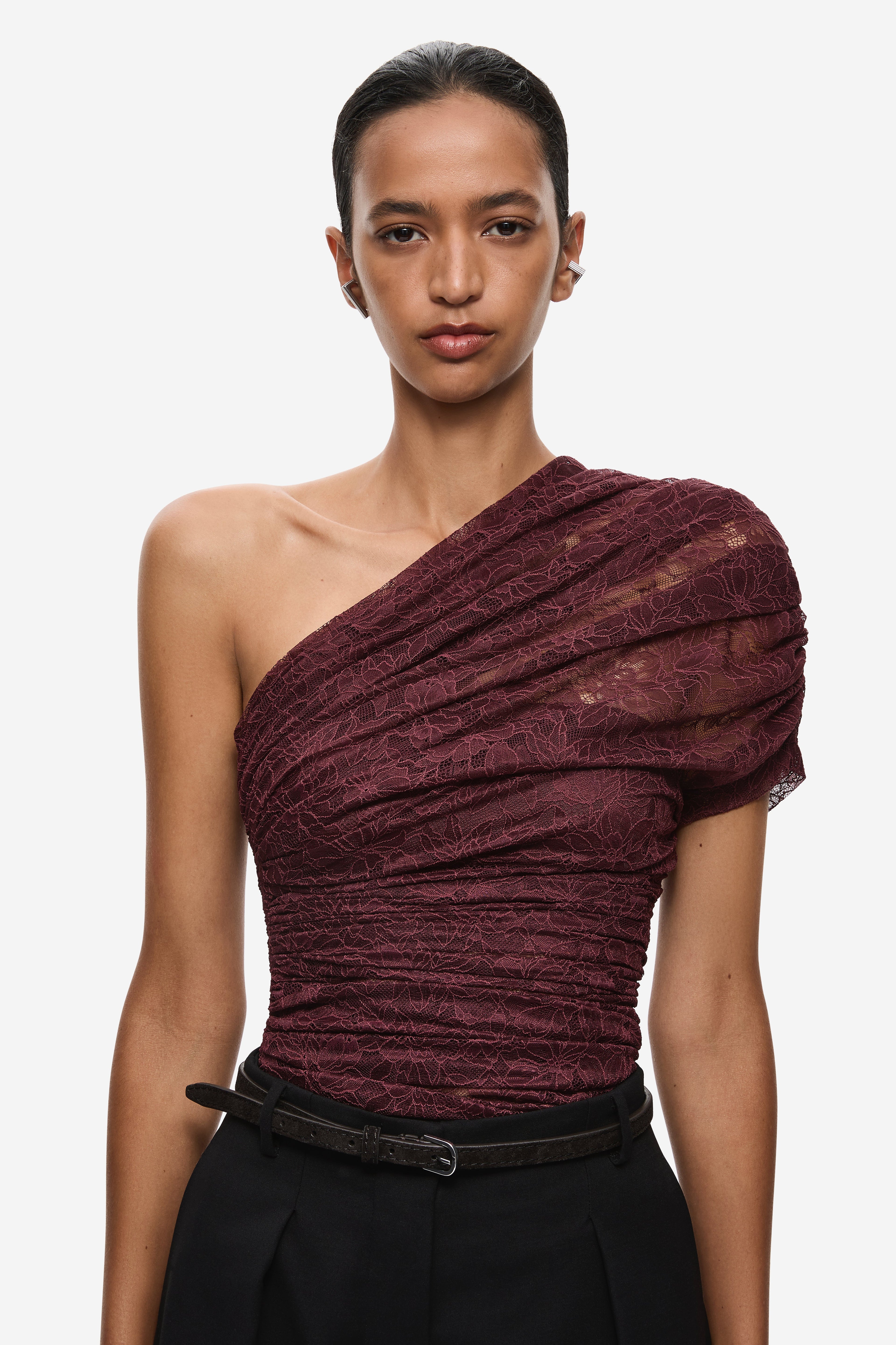 Currant maroon ruched one-shoulder lace top with draped sleeve detail