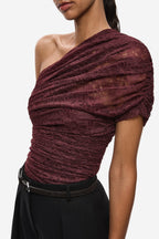 Currant maroon lace one-shoulder top with textured drape and ruching