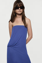 Blue strapless maxi jersey dress with gathered detail at the side of bust.