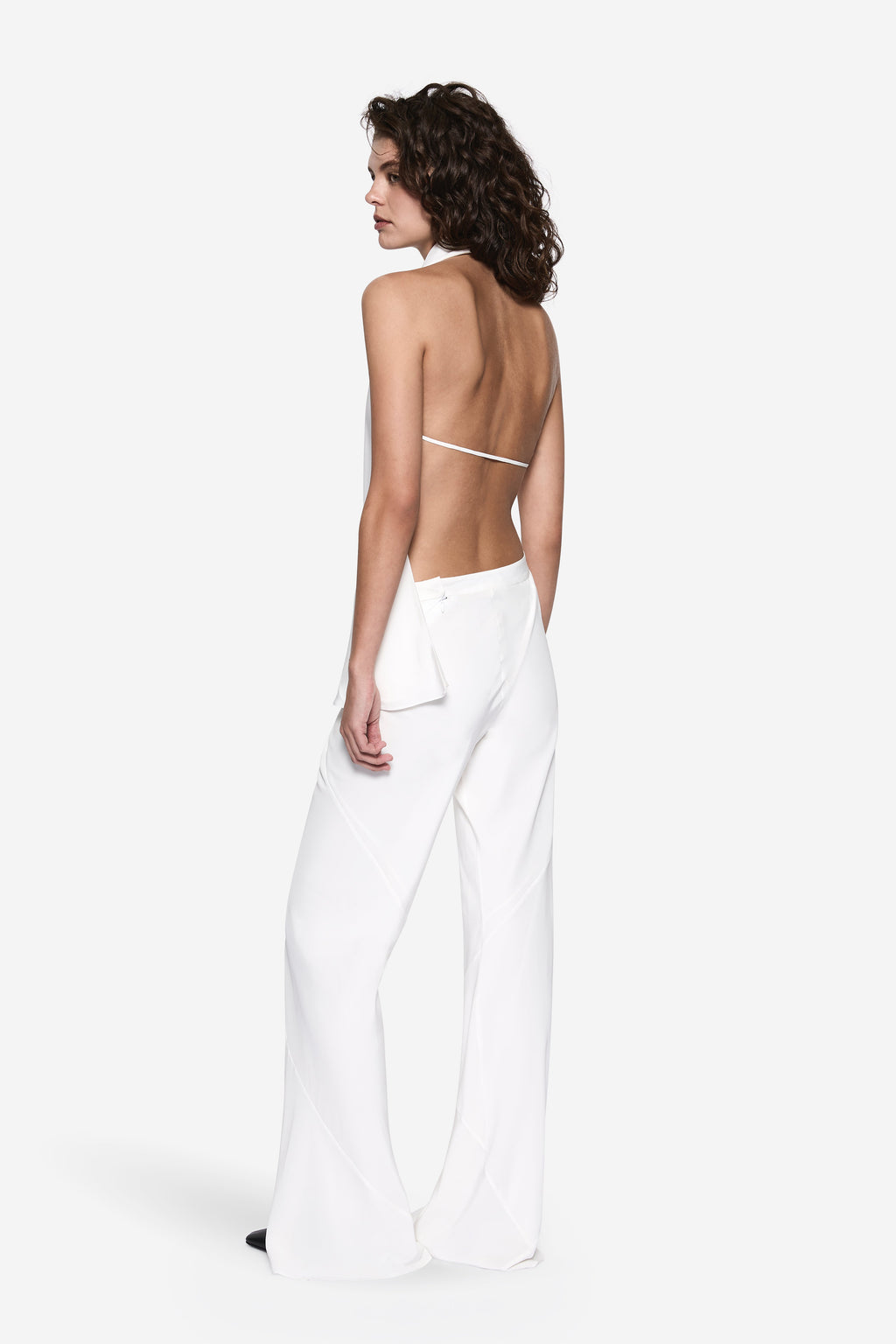 Ivory silk apron-style halter top with open back and thin tie strap