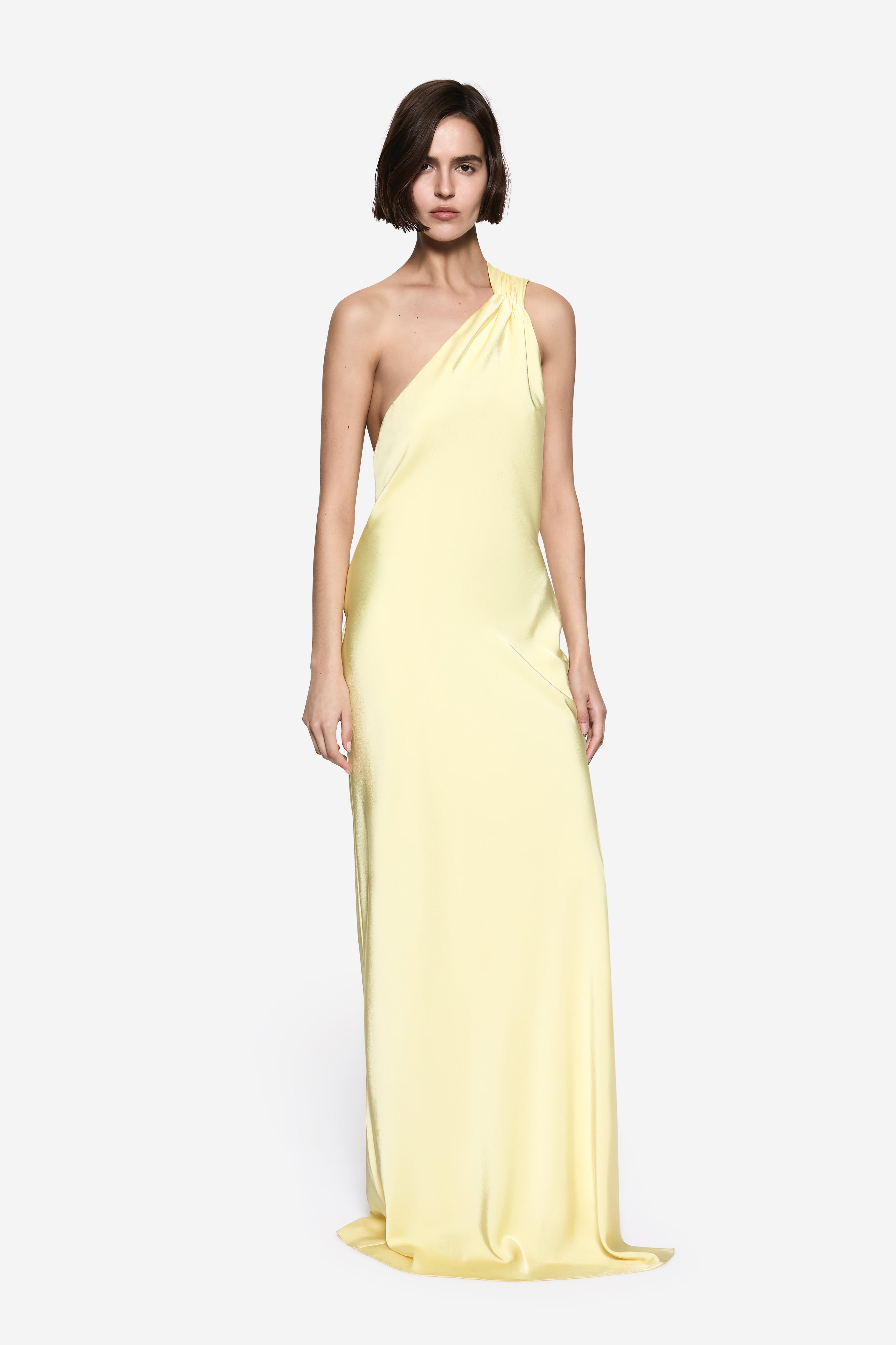 Lemon satin halter maxi dress with asymmetrical neckline and side drape, slim column silhouette