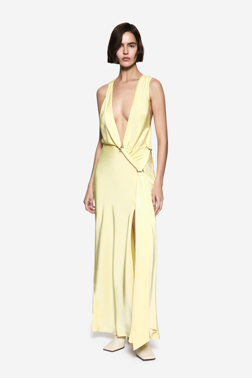 Lemon satin maxi dress with deep V neckline, draped waist, and high side slit