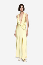 Lemon satin maxi dress with deep V neckline, draped waist, and high side slit