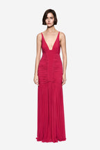 Hot pink jersey maxi dress, deep V neckline, ruched bodice, pleated fringe skirt