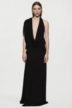 Black sleeveless jersey cowl gown with draped V neckline and long column skirt
