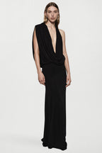 Black sleeveless jersey cowl gown with draped V neckline and floor-length column skirt