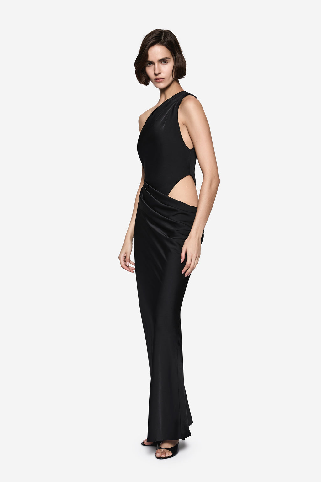 Black satin maxi dress with halter neckline and waist cutout