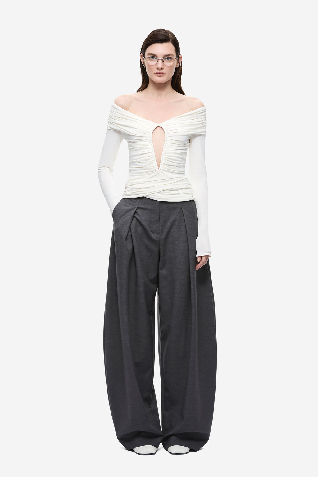 Ivory off-shoulder long-sleeve keyhole top with gathered neckline and seam details