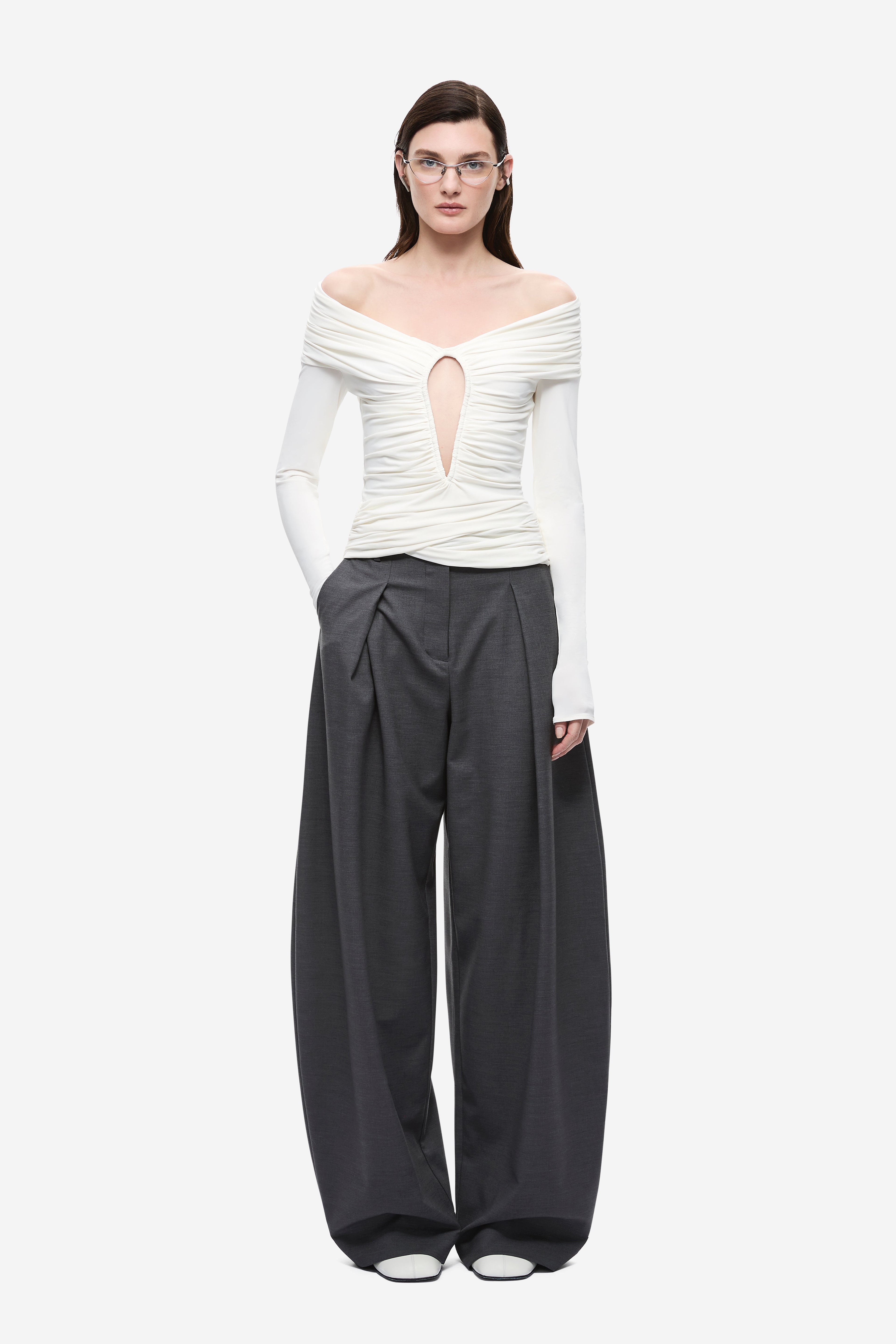 Ivory off-shoulder long-sleeve keyhole top with gathered neckline and seam details