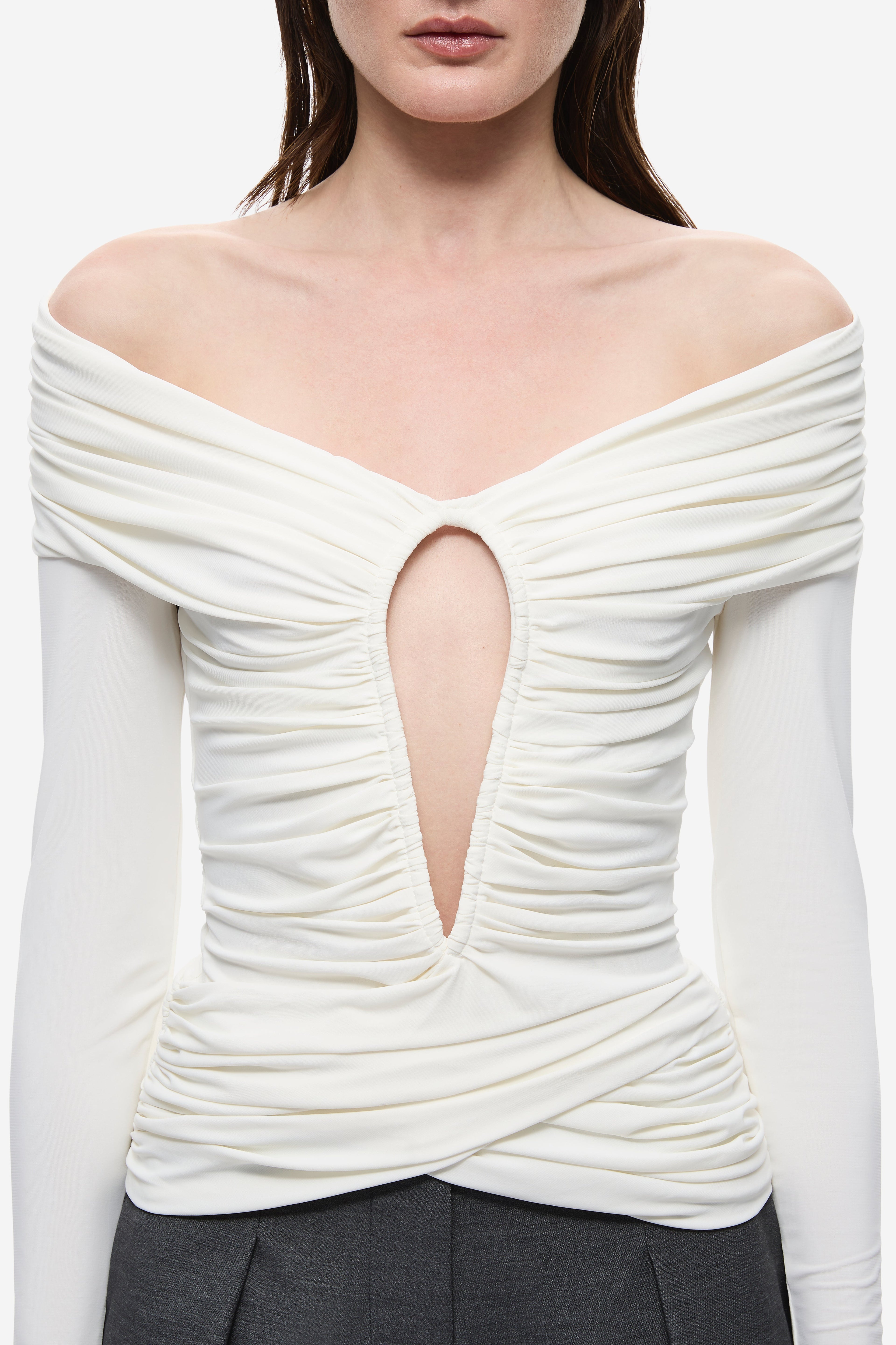 Ivory off-shoulder top with long sleeves and center keyhole front, ruched drape