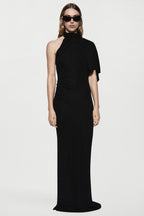 Black jersey cape dress with high neck and draped shoulder cape