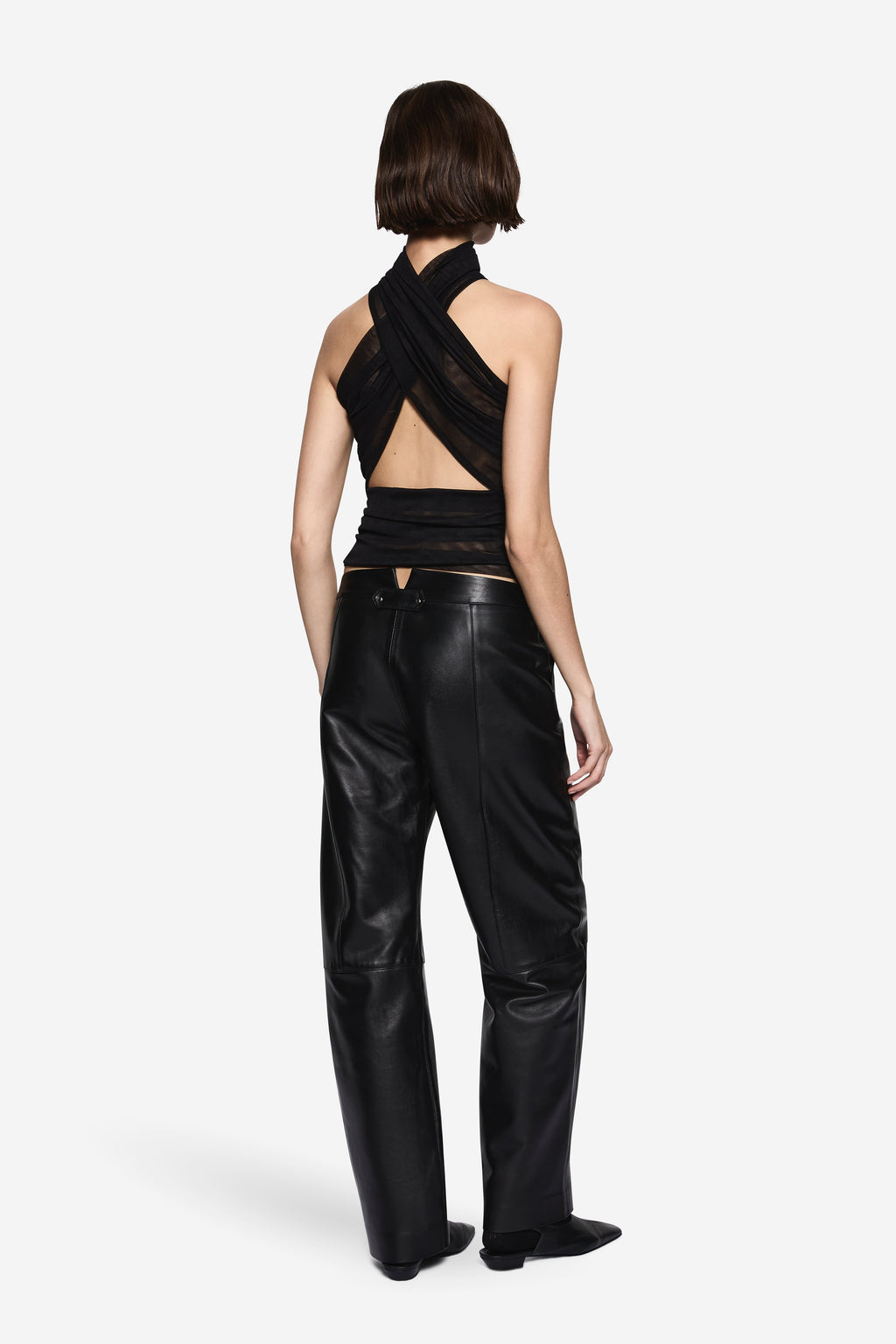 Black compact knit halter top with crisscross open back and draped front
