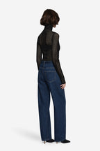 Black open-knit long sleeve turtleneck top with dotted grid back