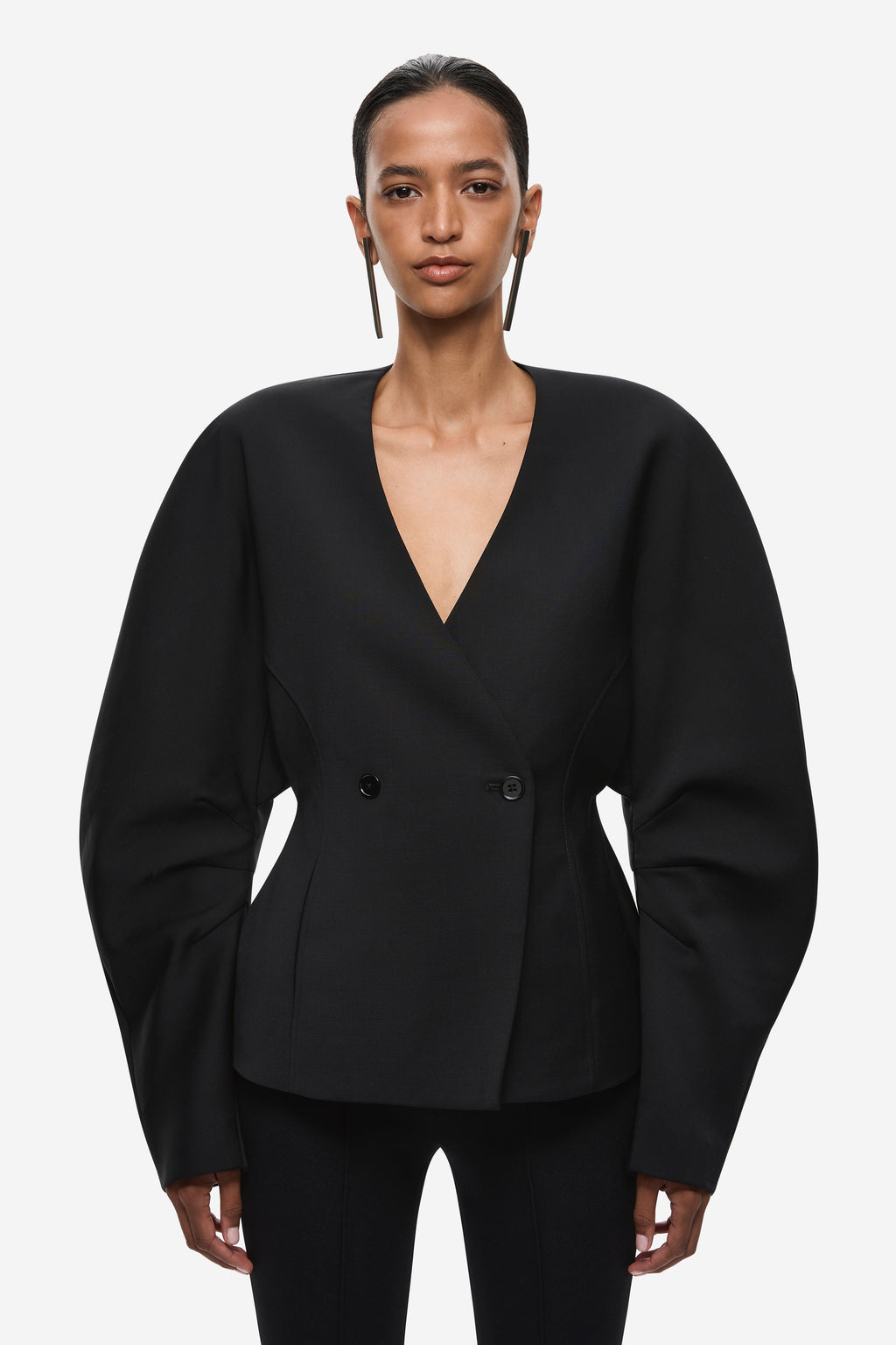 Black V-neck double-breasted blazer with two-button front and long sleeves