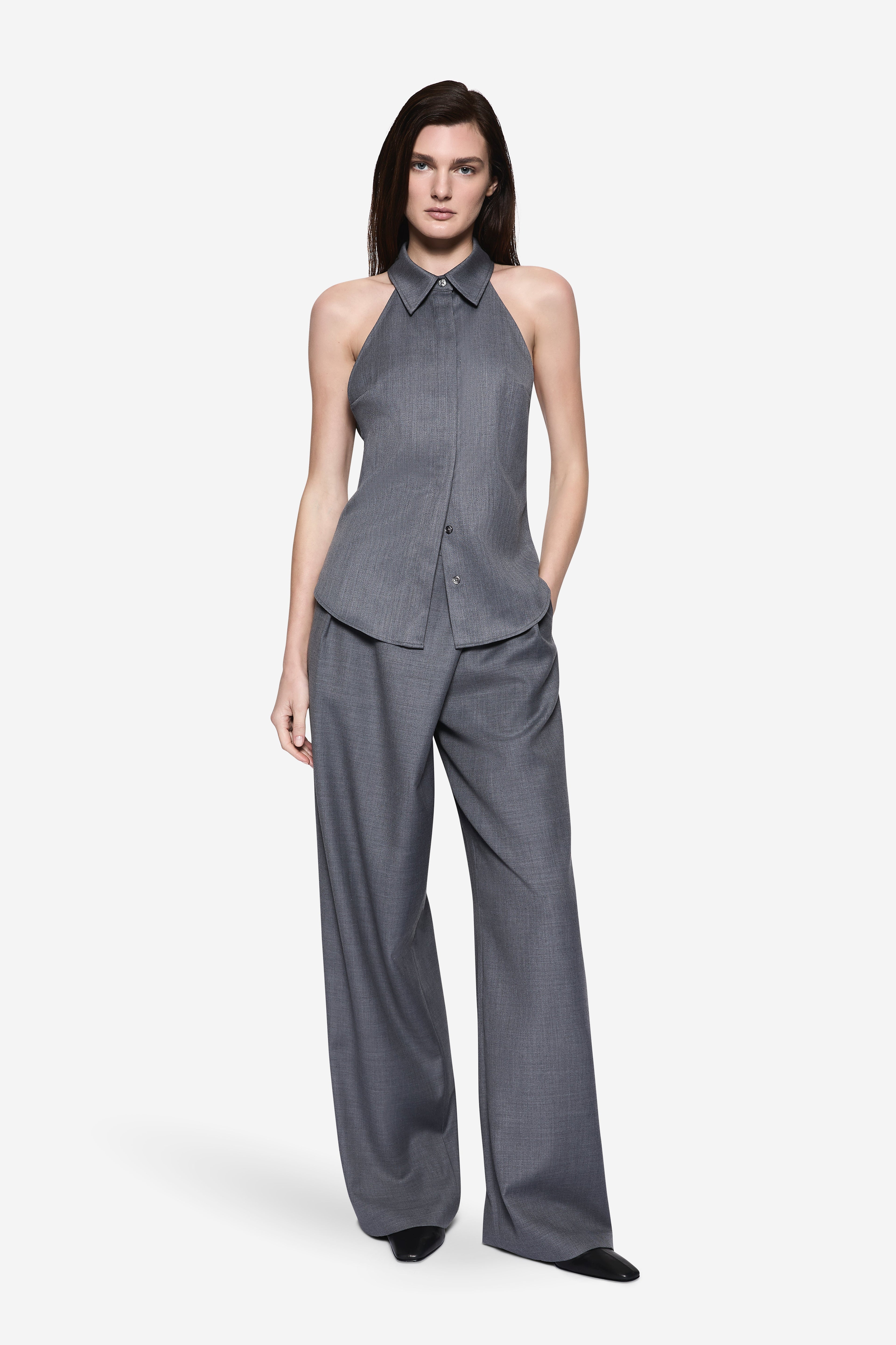 Grey halter suiting shirt with pointed collar and button front, sleeveless