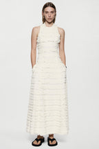 Winter white cotton fringe dress, sleeveless tiered ruffles, front view