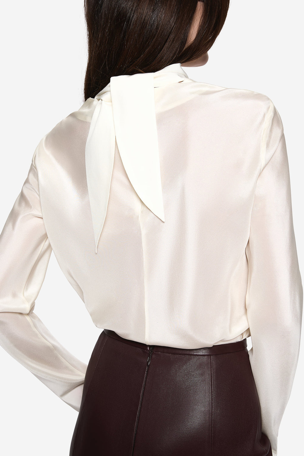 Winter-white sheer silk blouse with high neck and tied open-back detail