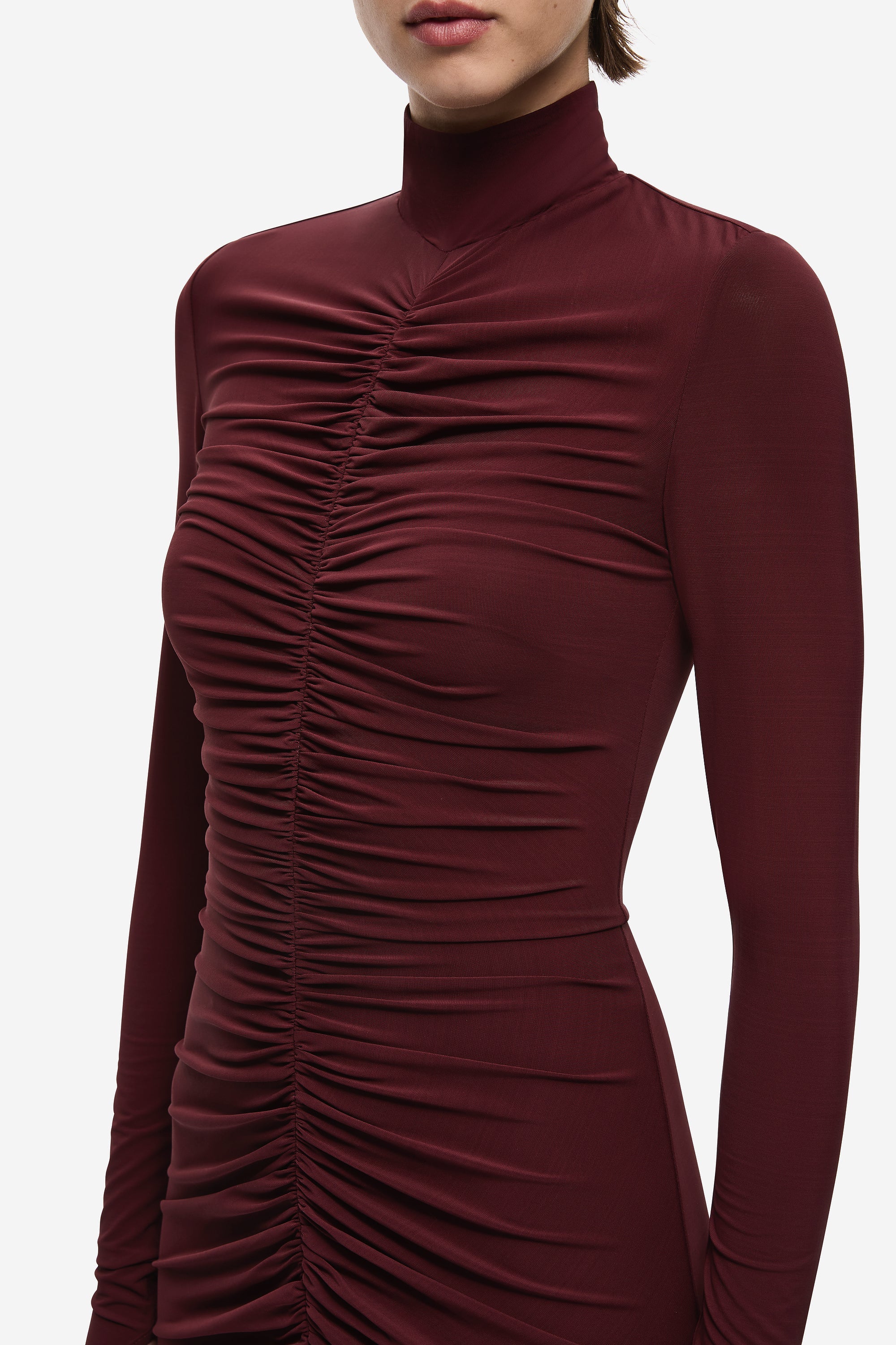 Maroon long-sleeve maxi dress close-up of ruched gathered detail at chest