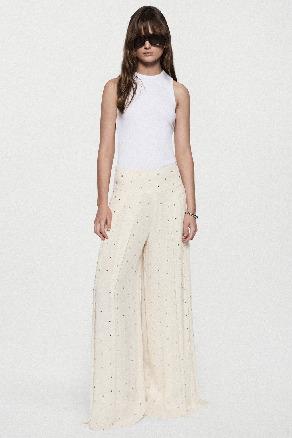Rhinestone palazzo pants in winter white with high-rise waistband and wide legs