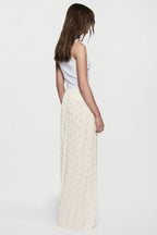 Winter white rhinestone palazzo pants viewed from back, high-rise wide legs