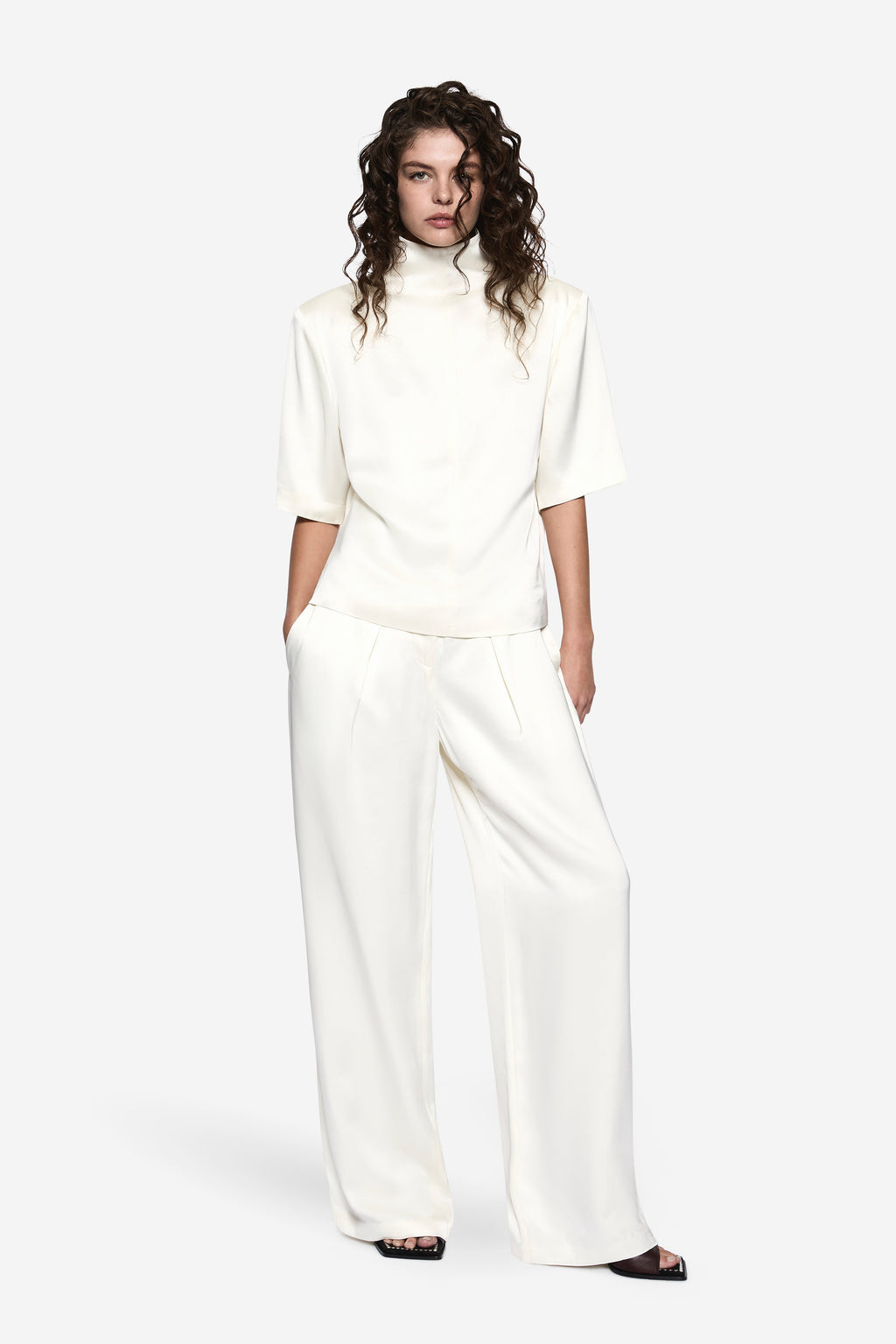 White acetate tee with high mock neck and short sleeves, relaxed fit