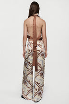 Silk trousers with LAGO swirl print, back drape and wide-leg flared cut