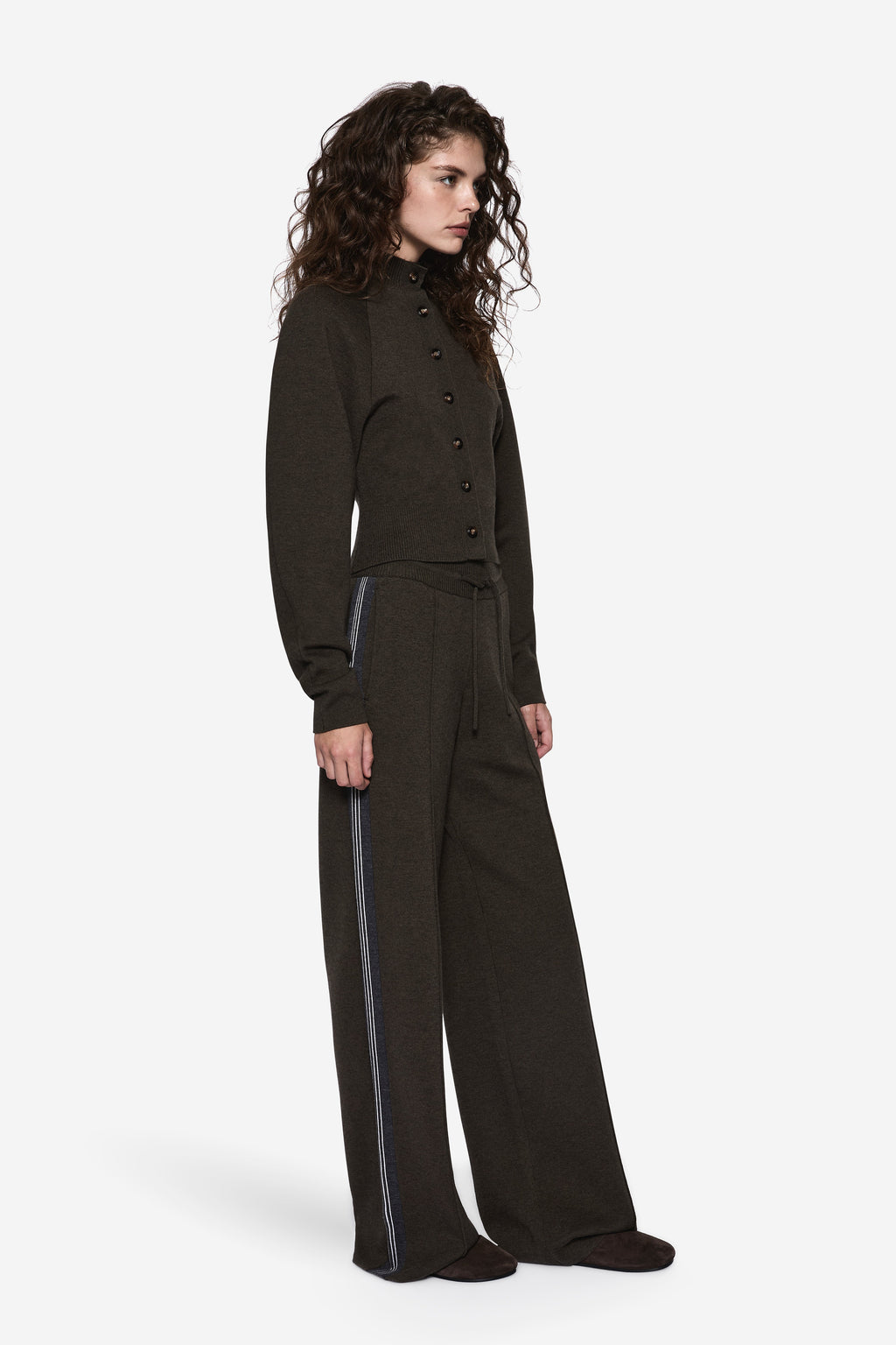 Merino knit pants in dark hunter green with blue side stripe and loose wide-leg cut