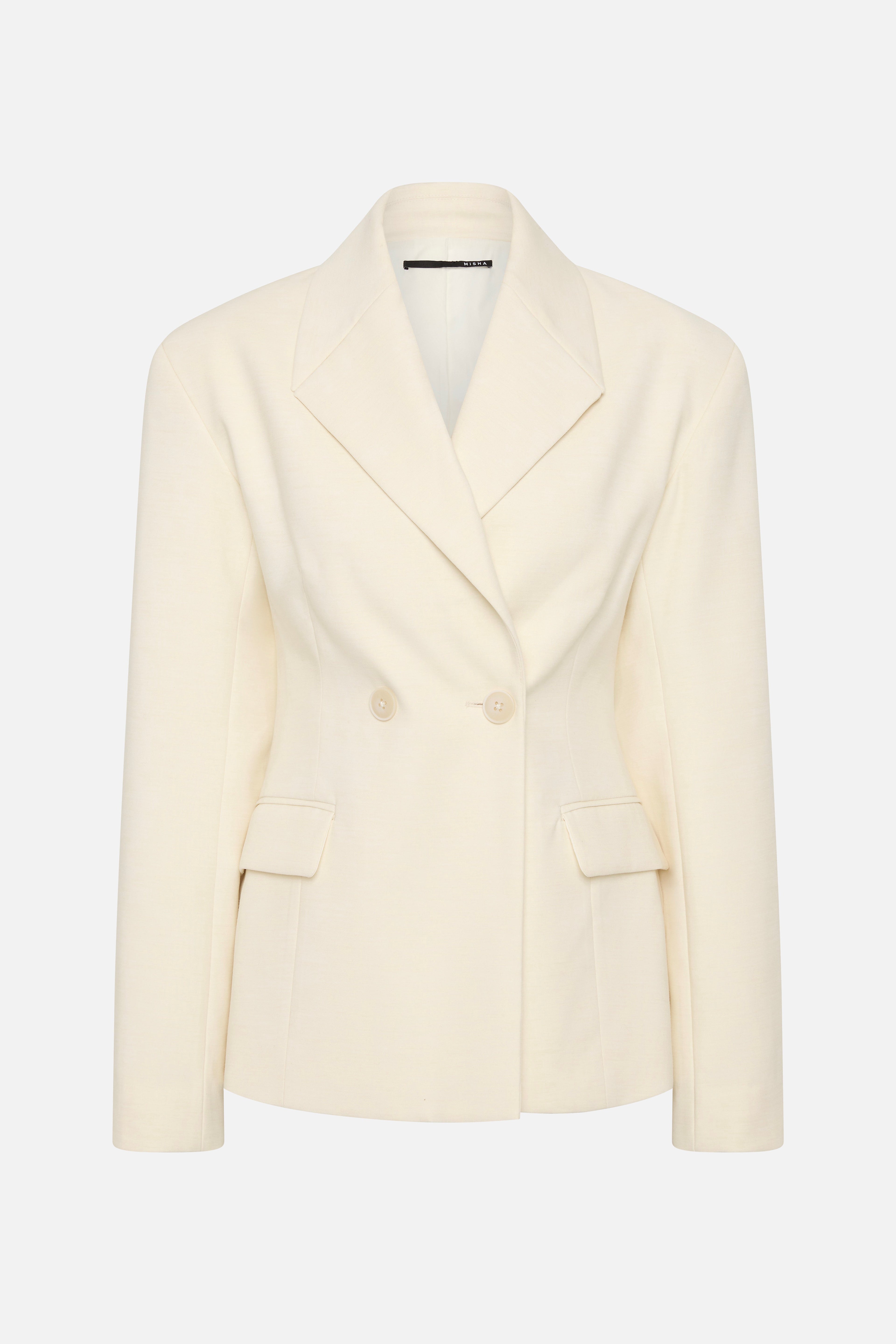 Cream blazer front view with notched lapels, flap pockets, and two-button closure.