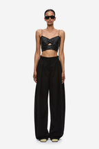 Black high-waist wide-leg sculpted trousers with pleated front