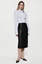 Black leather midi pencil skirt with high waistband and straight, fitted silhouette