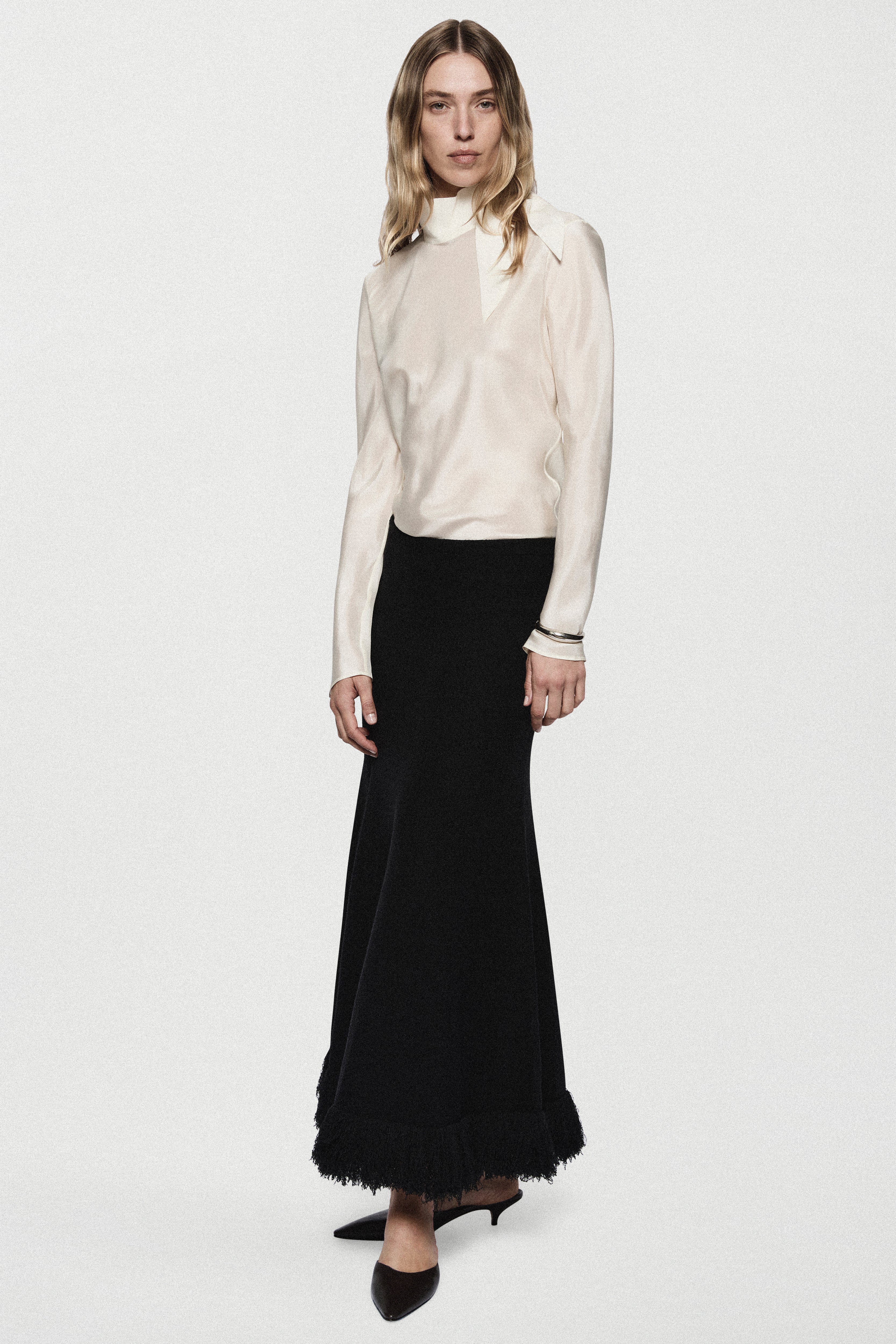 Black boucle midi skirt, straight cut, scalloped fringe hem