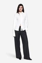 MILA ivory jersey button-up shirt with pointed collar and long sleeves, side slits