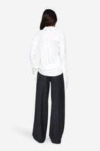 MILA ivory jersey button-up shirt, back view with pointed collar and long sleeves