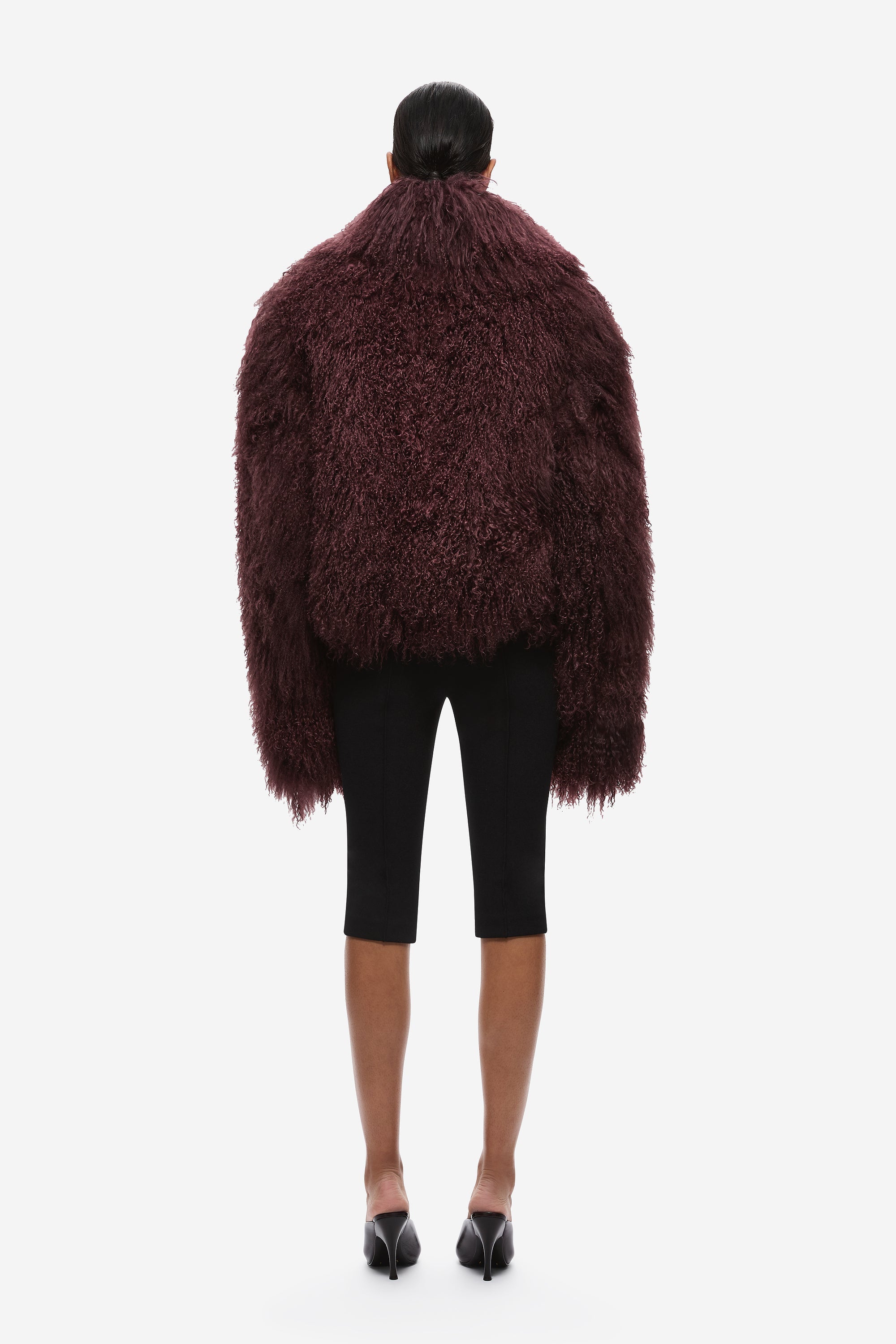 Maroon shearling jacket back view with full sleeves and textured, cropped hem