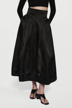 Black organza midi skirt with gathered pleats and flared hem
