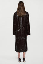 Back view of bitter chocolate patent leather coat, long glossy finish, button details