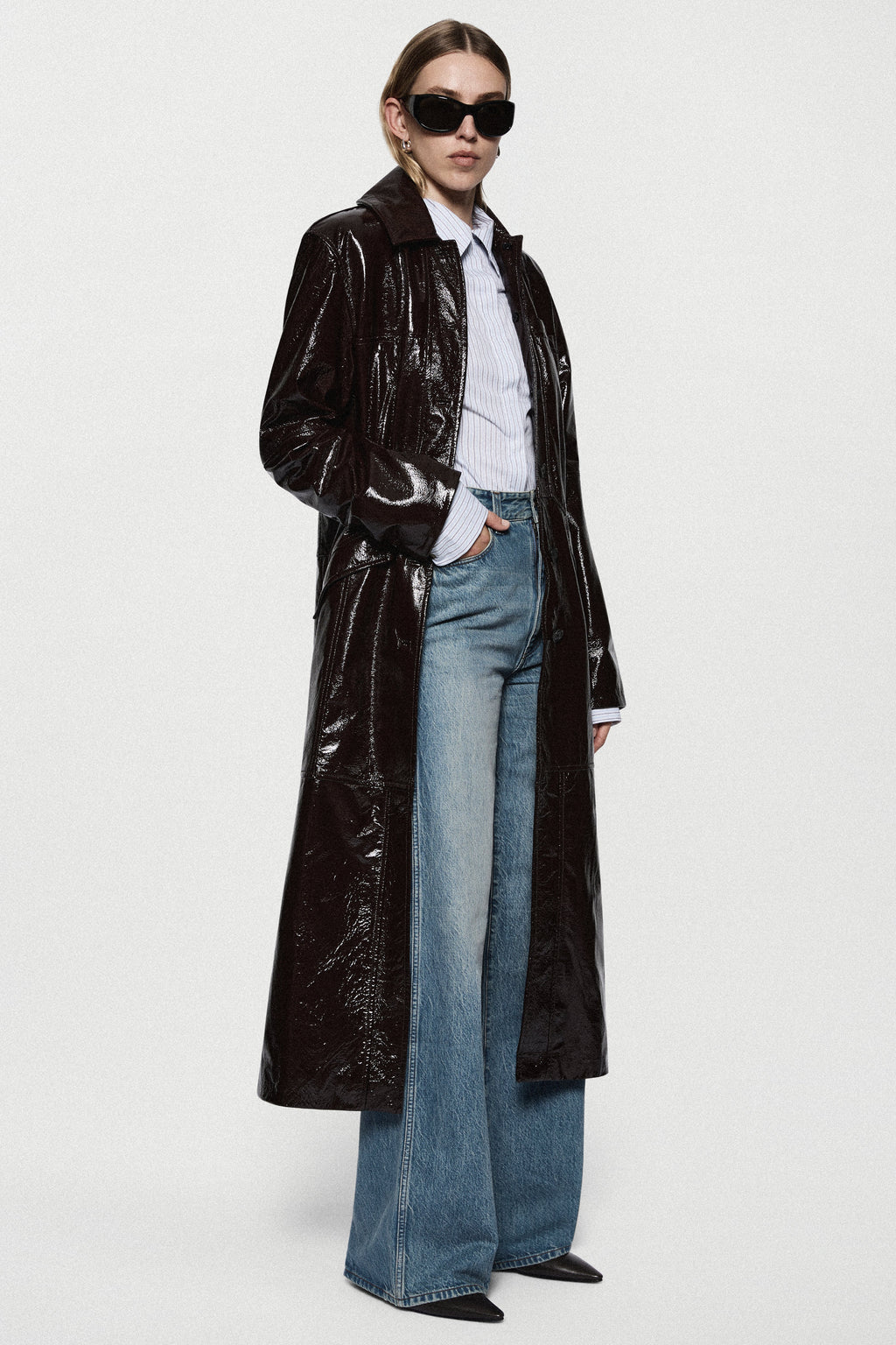 Bitter chocolate patent leather coat, long glossy finish, button front, standing collar