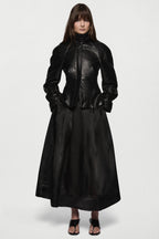 Black leather jacket front view with stand collar, zipper closure, and peplum hem.